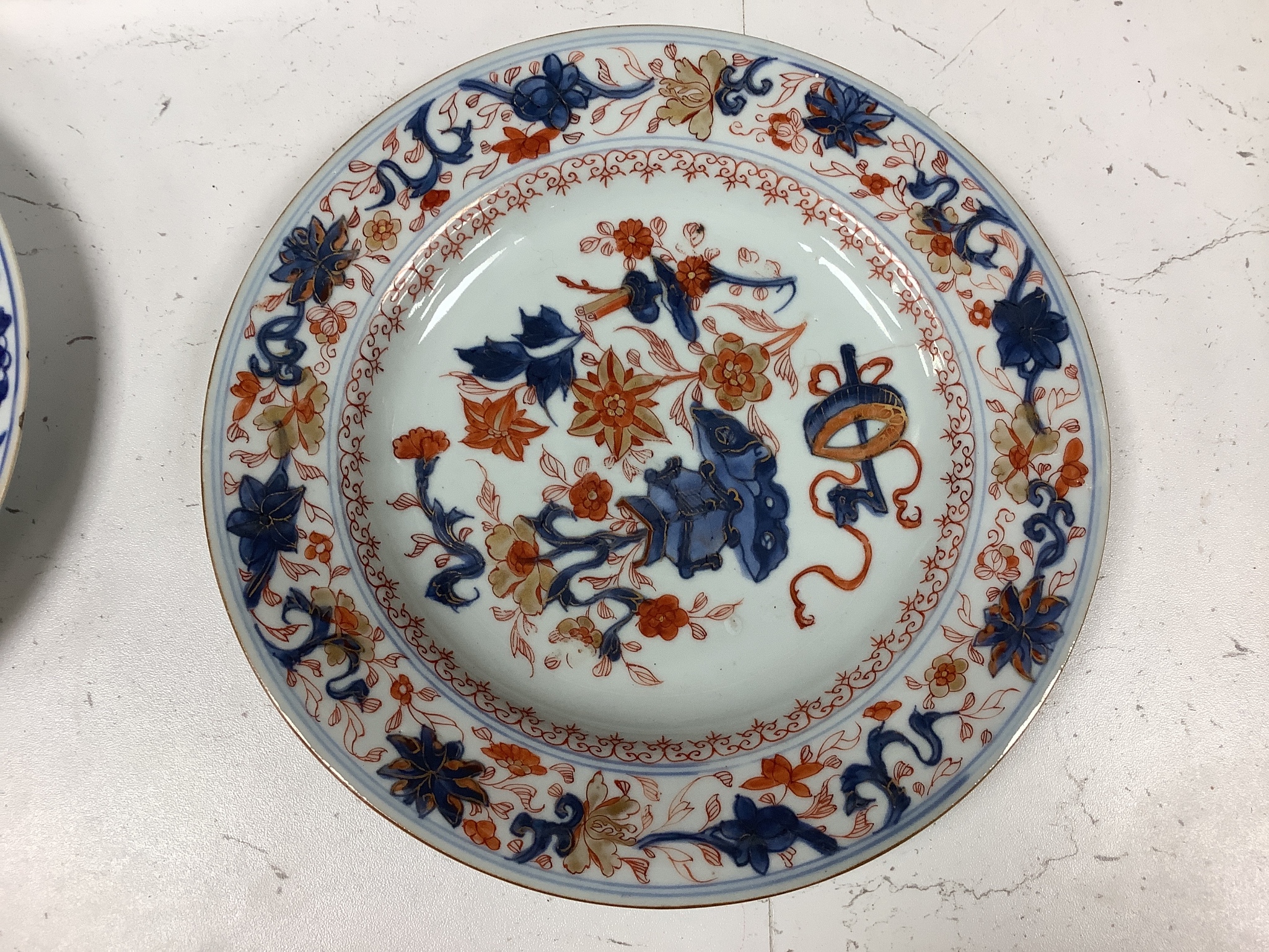 A pair of 18th century Chinese blue and white plates, together with two Chinese Imari dishes, all Kangxi period, largest 23cm